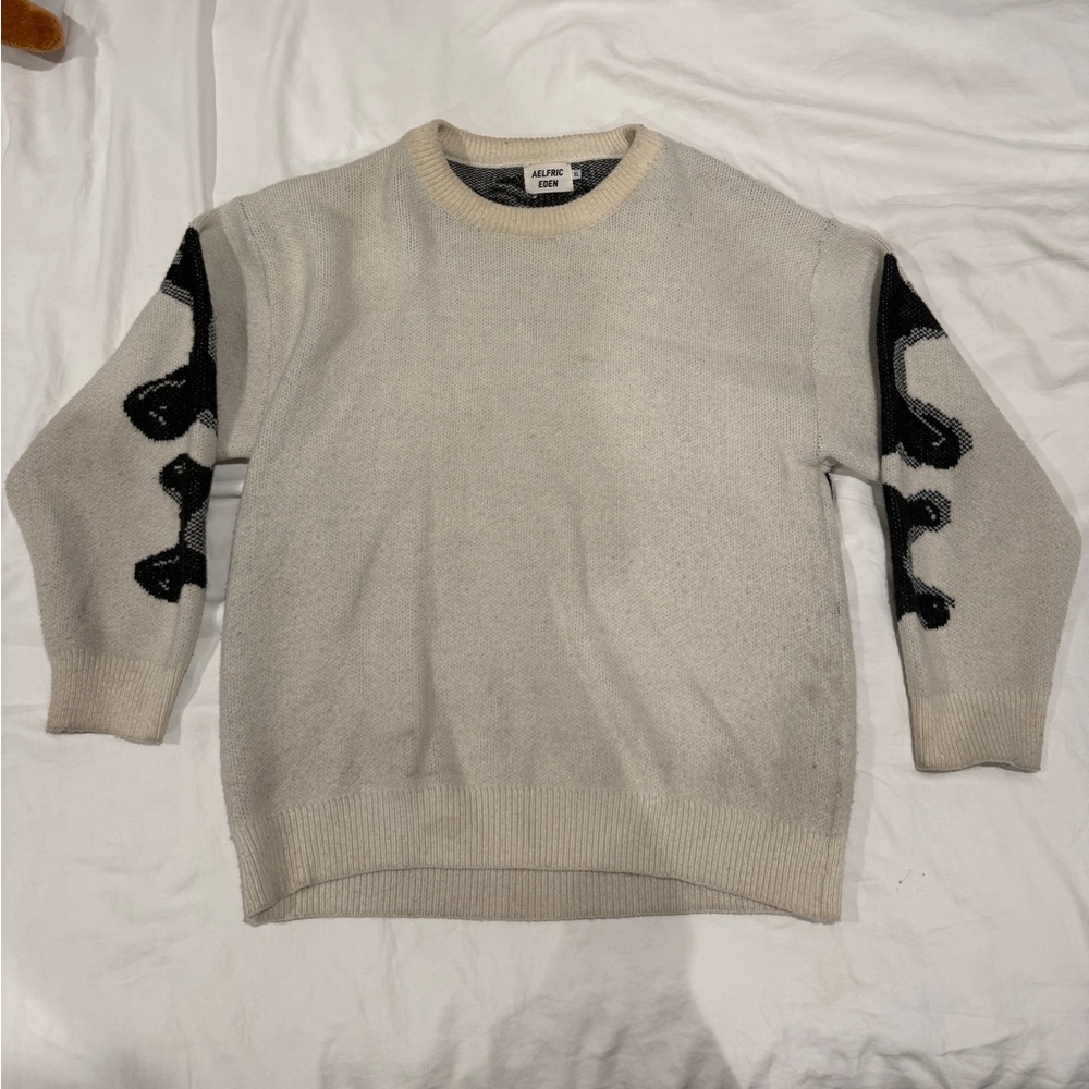 Aelfric Eden off white sweater with black skeleton design